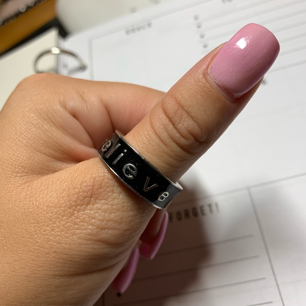 Black “Believe” Ring